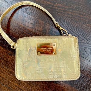 Authentic Michael Kors patent gold leather wristlet